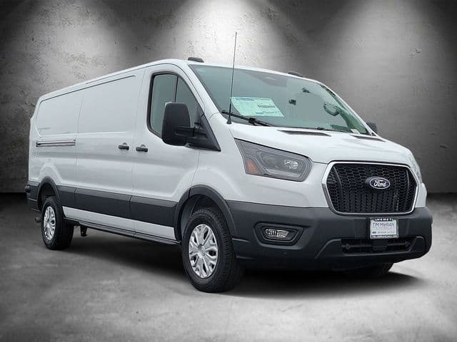 Ford Transit 150 low-roof cargo van in white, front three-quarter view